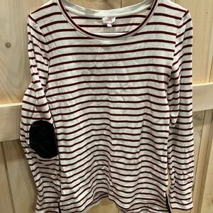 Red and white striped top with black leather elbow patches